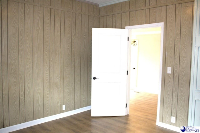 114 Law St, Darlington, SC 29532 - unfurnished room featuring wood walls, baseboards, and wood finished floors