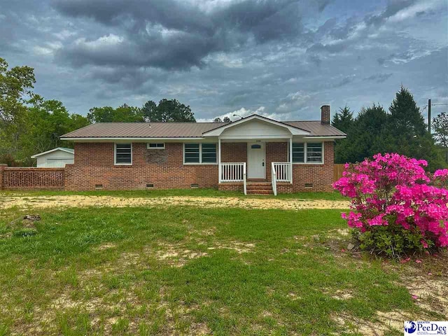 1644 Sugar Hill Rd, Dillon, SC 29536 - single story home featuring a front yard, fence, brick siding, and crawl space