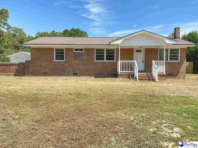 single story home featuring a front lawn and a porch