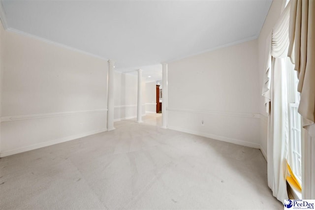 carpeted empty room with ornamental molding