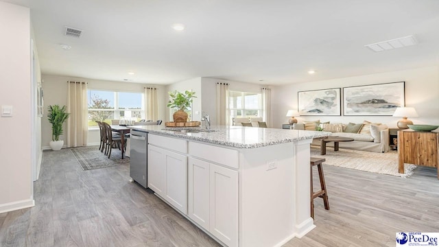 593 Strawberry Field Way, Galivants Ferry, SC 29544 - kitchen with a sink, dishwasher, plenty of natural light, light stone counters, and recessed lighting