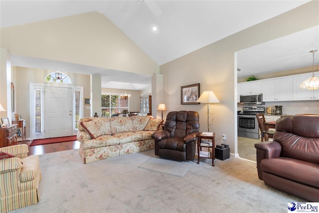 2122 Twin Bridge Dr, Florence, SC 29505 - living room featuring a chandelier, high vaulted ceiling, a ceiling fan, light carpet, and recessed lighting