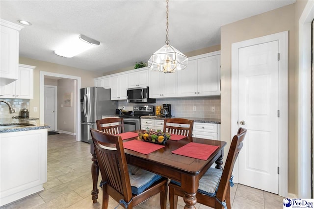 2122 Twin Bridge Dr, Florence, SC 29505 - dining room featuring a chandelier