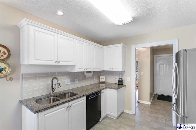 2122 Twin Bridge Dr, Florence, SC 29505 - kitchen featuring freestanding refrigerator, black dishwasher, white cabinetry, a textured ceiling, and recessed lighting