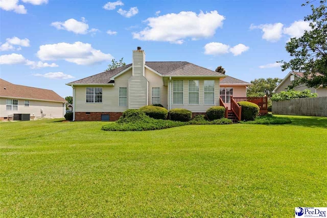 2122 Twin Bridge Dr, Florence, SC 29505 - rear view of property featuring crawl space, a chimney, a deck, and roof with shingles