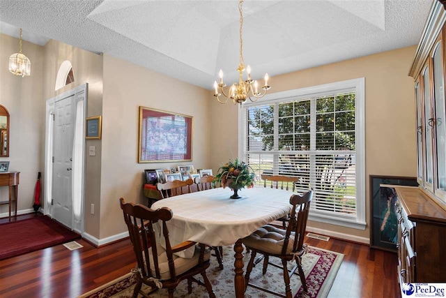 2122 Twin Bridge Dr, Florence, SC 29505 - dining area featuring a chandelier, wood finished floors, and a textured ceiling