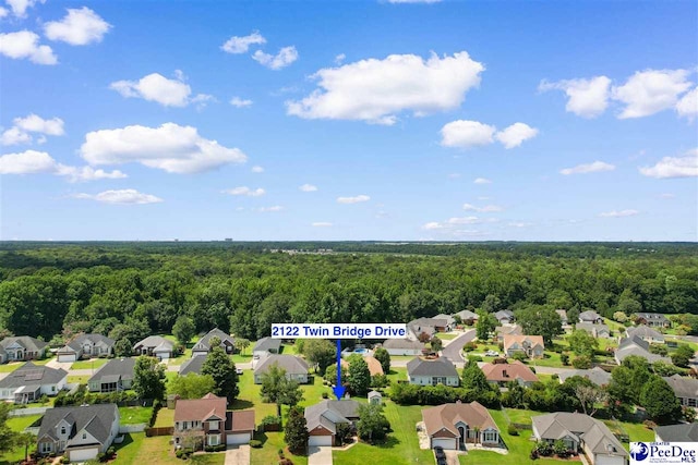 2122 Twin Bridge Dr, Florence, SC 29505 - aerial view of residential area featuring a heavily wooded area
