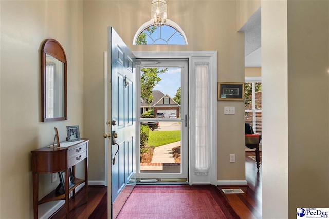 2122 Twin Bridge Dr, Florence, SC 29505 - foyer with wood finished floors, plenty of natural light, and a towering ceiling
