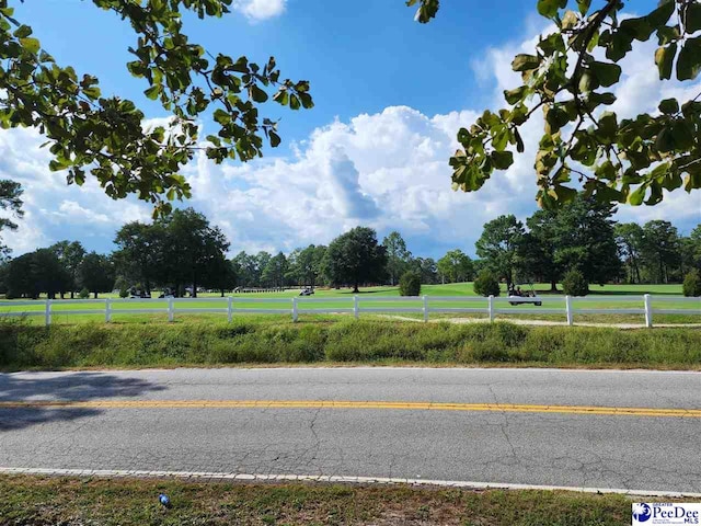 view of road with a rural view