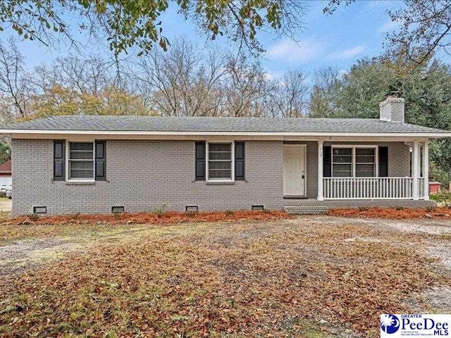 ranch-style house featuring covered porch