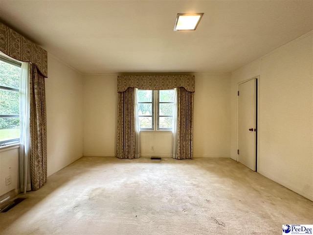 view of carpeted spare room