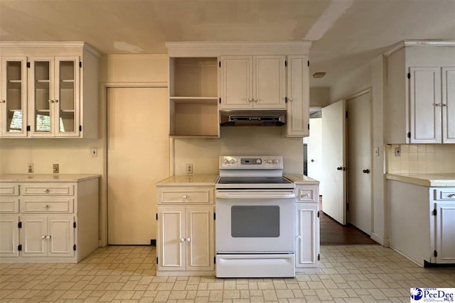 kitchen with white electric range and decorative backsplash