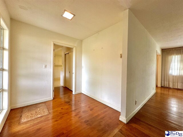 spare room featuring hardwood / wood-style flooring