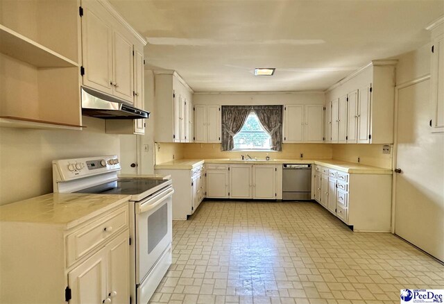 kitchen featuring dishwasher, sink, white electric range oven, and white cabinets