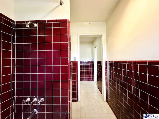 interior space featuring tile walls and tile patterned floors