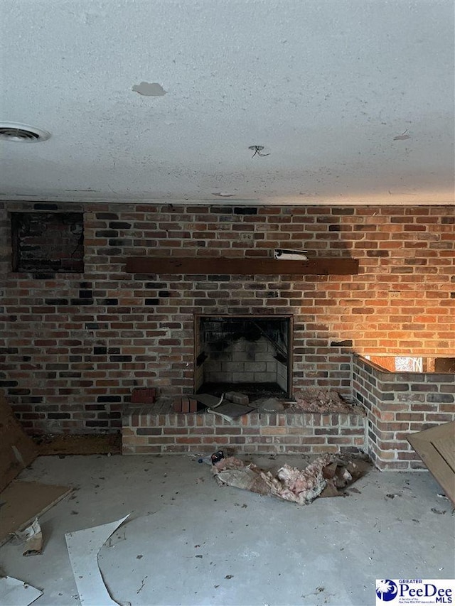 interior details with visible vents and a textured ceiling