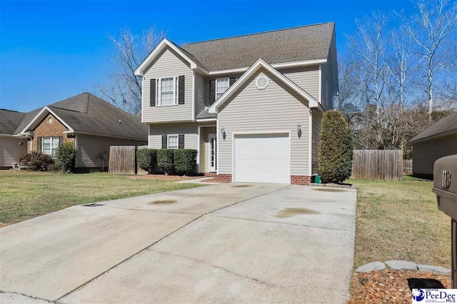 view of front of home with concrete driveway, fence, and a front lawn