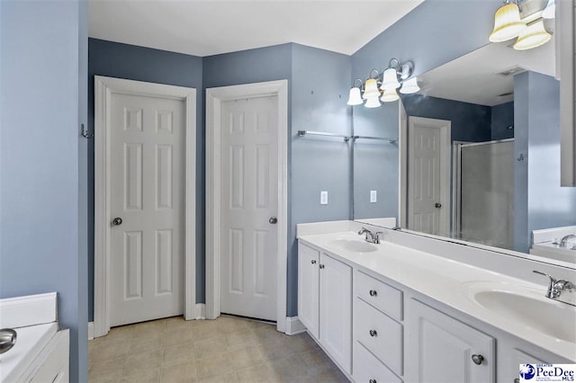 full bath with double vanity, a stall shower, a sink, and a washtub