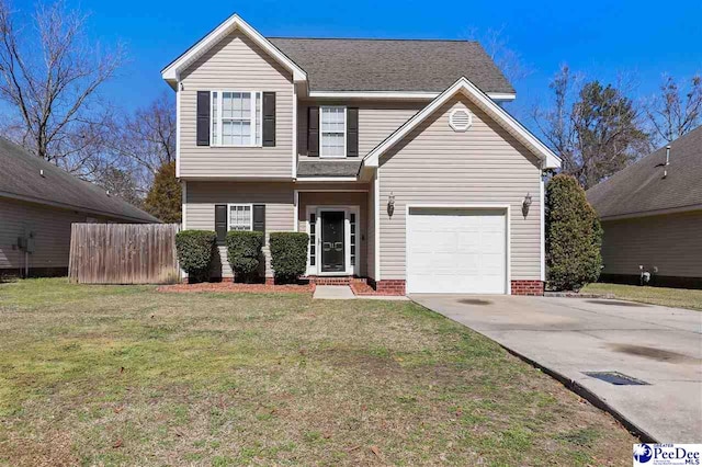 traditional home with driveway, a garage, roof with shingles, fence, and a front lawn