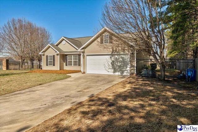 view of front of home with a garage, driveway, a front lawn, and fence