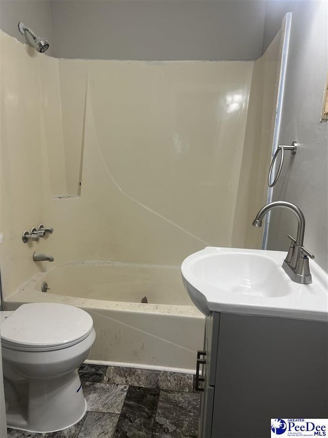 full bathroom featuring vanity, toilet, and shower / bathtub combination