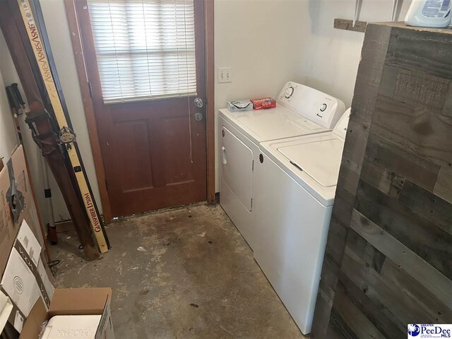 laundry room with washer and clothes dryer