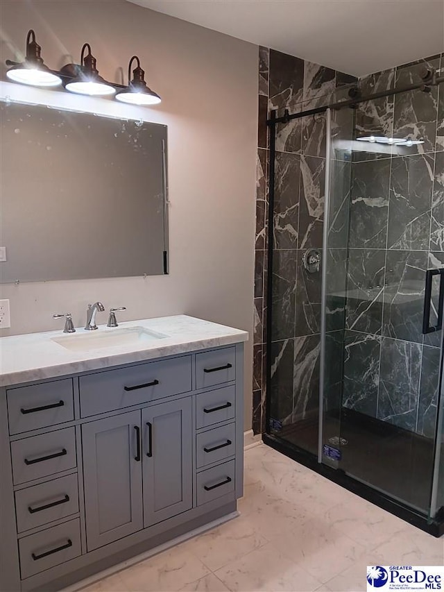 bathroom with vanity and an enclosed shower