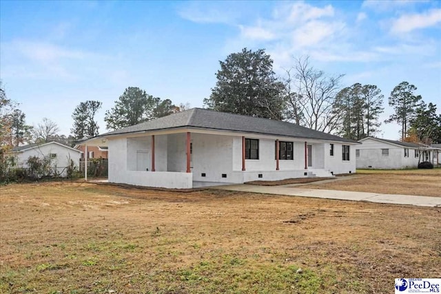 ranch-style house with a front yard