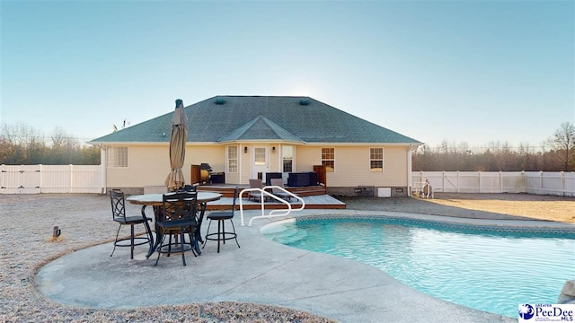 view of pool with a fenced backyard, a patio, and a fenced in pool
