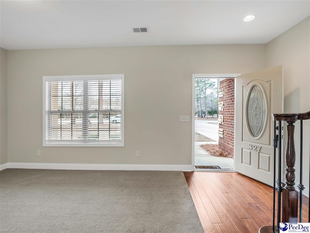 foyer with hardwood / wood-style flooring