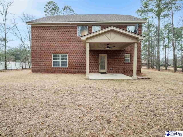 view of front of house featuring a patio area, a front yard, and ceiling fan