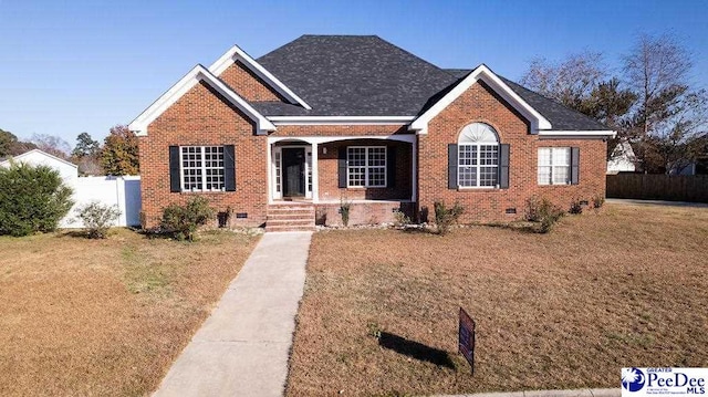 view of front of home featuring a front lawn