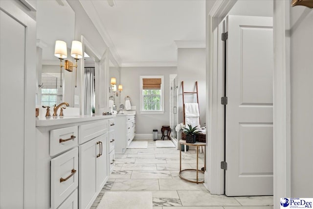 bathroom with marble finish floor, vanity, ornamental molding, and a stall shower