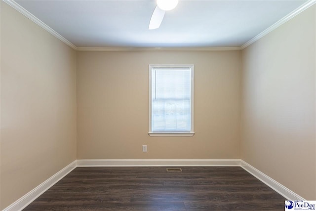 unfurnished room featuring crown molding and dark wood-type flooring