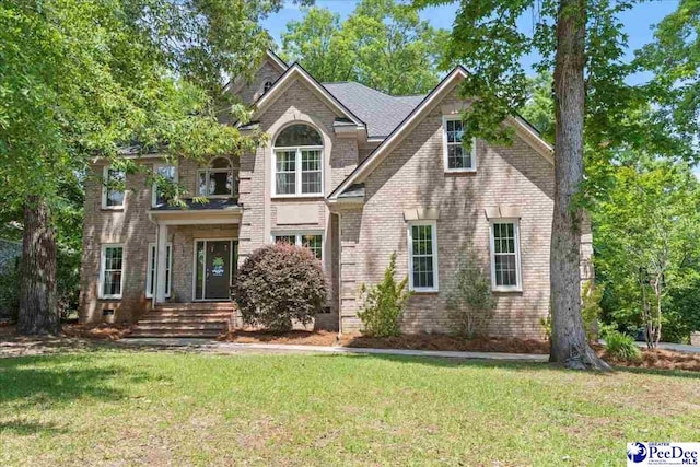 3250 Hampton Pointe Dr, Florence, SC 29501 - view of front facade with a front lawn and brick siding