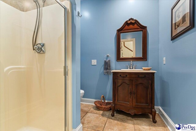 3250 Hampton Pointe Dr, Florence, SC 29501 - bathroom featuring a stall shower, baseboards, vanity, and toilet