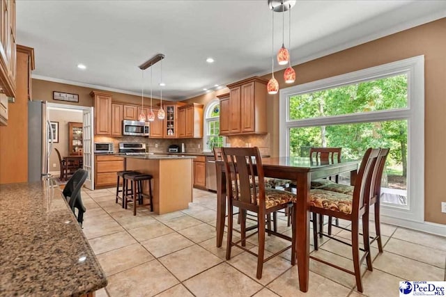 3250 Hampton Pointe Dr, Florence, SC 29501 - dining room featuring crown molding, plenty of natural light, light tile patterned flooring, and recessed lighting