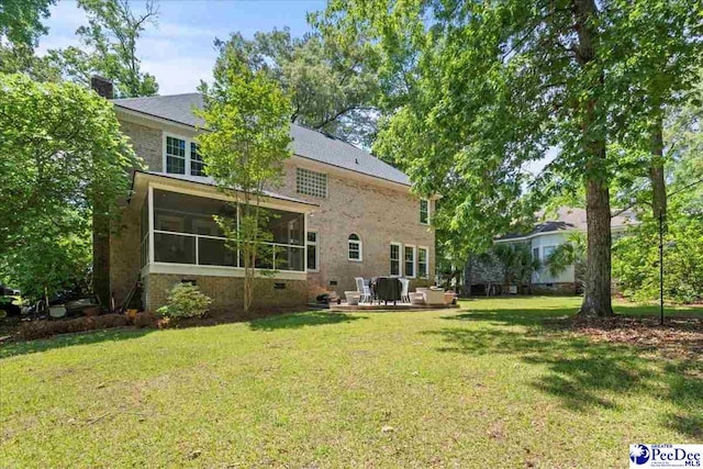 3250 Hampton Pointe Dr, Florence, SC 29501 - rear view of house with a lawn and a patio area