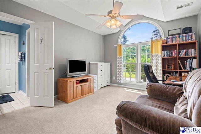 3250 Hampton Pointe Dr, Florence, SC 29501 - living room featuring vaulted ceiling, light carpet, baseboards, a ceiling fan, and light tile patterned flooring