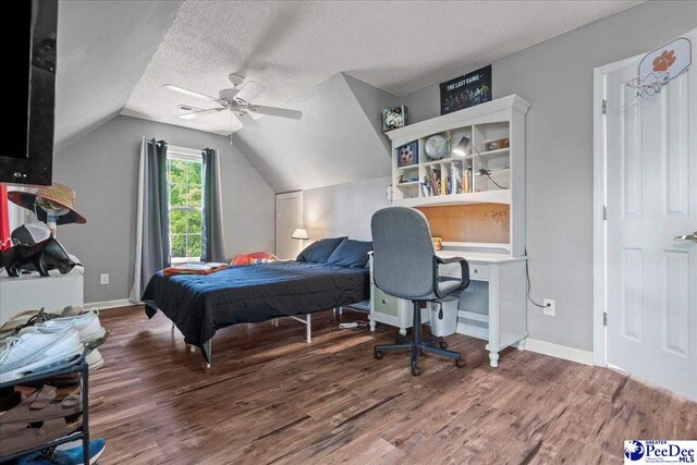 3250 Hampton Pointe Dr, Florence, SC 29501 - bedroom featuring wood finished floors, a textured ceiling, baseboards, lofted ceiling, and a ceiling fan