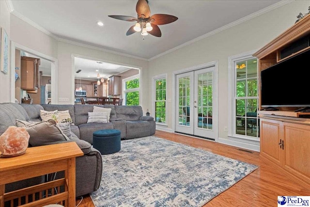 3250 Hampton Pointe Dr, Florence, SC 29501 - living area with light wood-style floors, a ceiling fan, ornamental molding, french doors, and recessed lighting