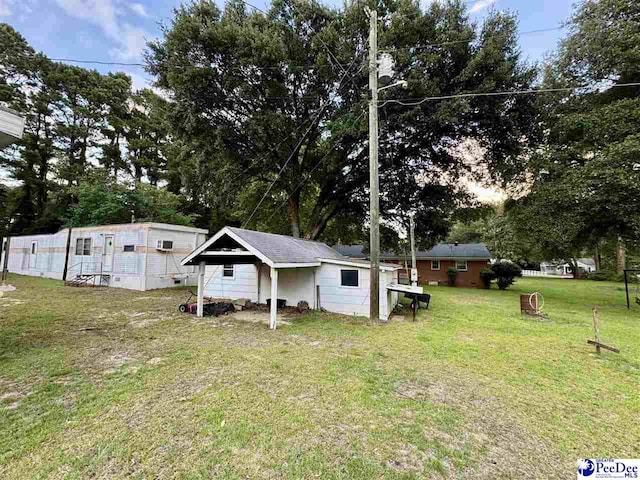 109 Tec Rd, Cheraw, SC 29520 - view of grassy yard featuring an outbuilding and view of wooded area