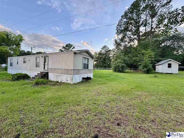 109 Tec Rd, Cheraw, SC 29520 - view of property exterior featuring entry steps, a yard, and an outdoor structure