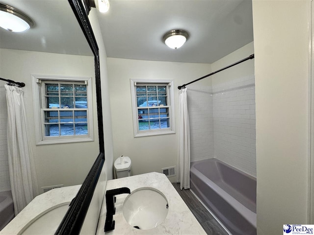 109 Tec Rd, Cheraw, SC 29520 - full bathroom featuring vanity, shower / tub combo, and wood finished floors
