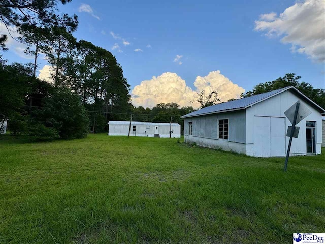 109 Tec Rd, Cheraw, SC 29520 - view of grassy yard with an outbuilding