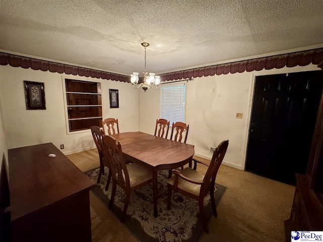 109 Tec Rd, Cheraw, SC 29520 - dining room featuring carpet, a chandelier, a textured ceiling, and built in shelves