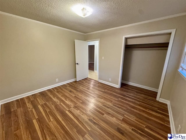 109 Tec Rd, Cheraw, SC 29520 - unfurnished bedroom featuring a textured ceiling, wood finished floors, crown molding, and a closet