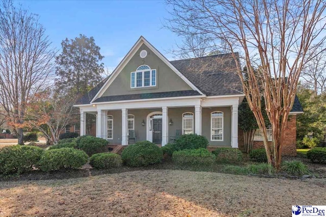 view of front of house featuring covered porch