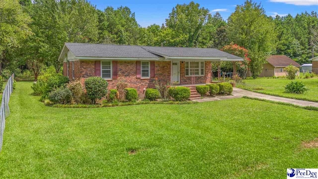 single story home with covered porch and a front lawn