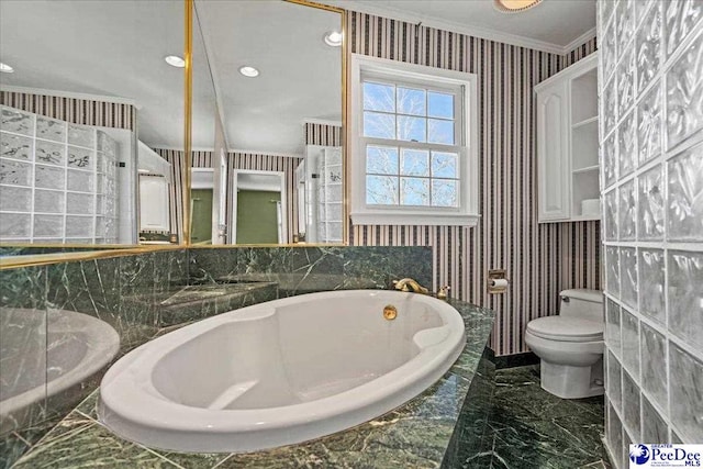 full bath featuring wallpapered walls, toilet, marble finish floor, crown molding, and a bath